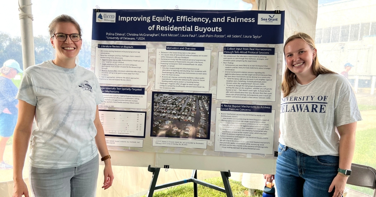 Prof. Christina McGranaghan and graduate student Laura Taylor present a poster at Coast Day 2023. Taylor’s thesis project is affiliated with a bigger project looking to improve home acquisition strategies and perceptions.