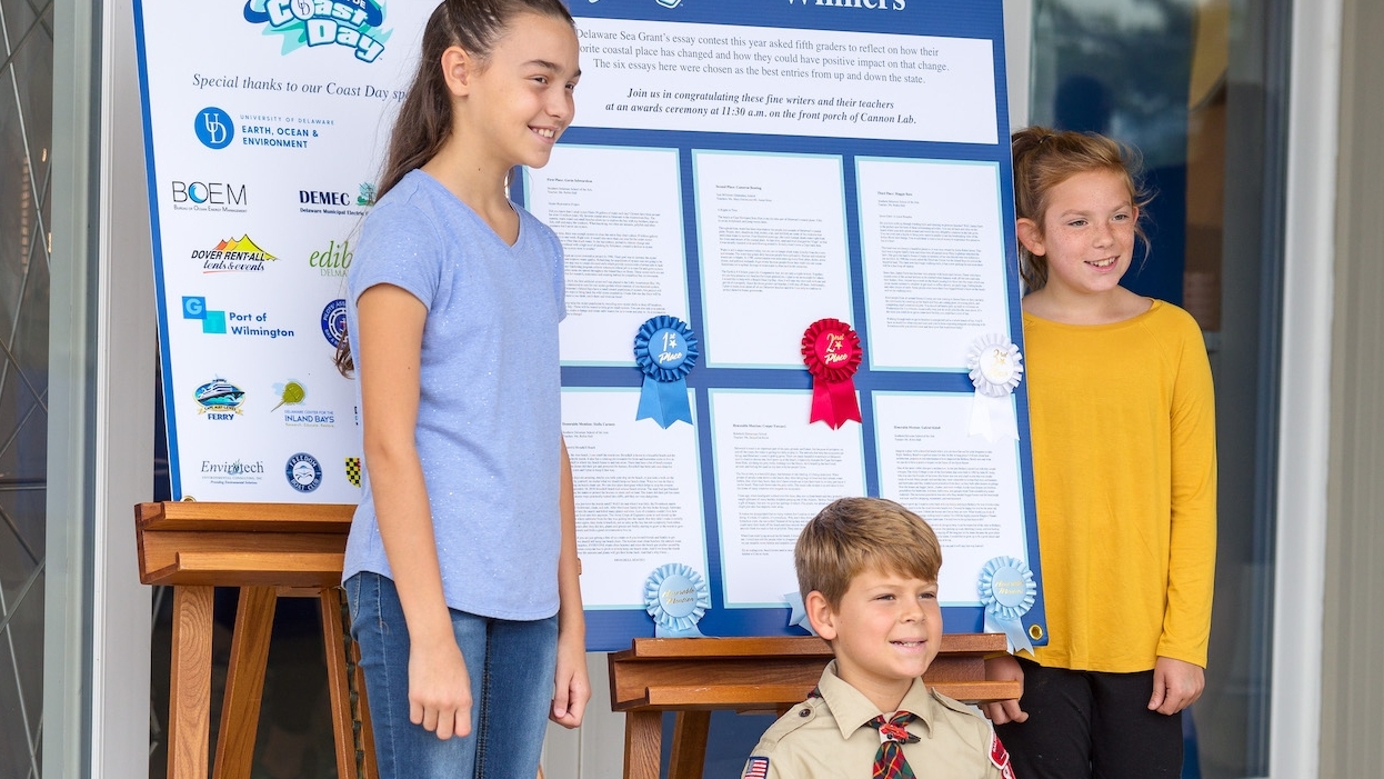 Coast Day In Lewes Delaware Coast Day essay winners pose next to their entries