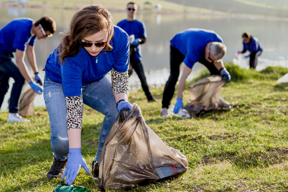 Students outside on a litter cleanup trip