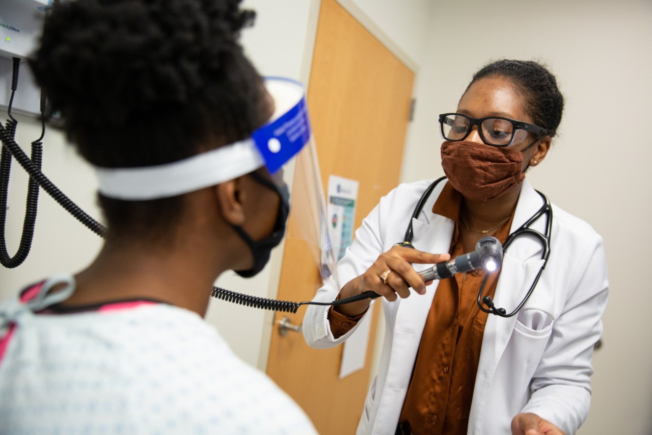 Nursing graduate students participate in a healthcare theatre simulation in the Nurse Managed Primary Care Center and practice suturing. 

Pictured: Sheavone Boyd, 4th year DNP student with Oluwapelumi Osunkoya, UD class of 2021 and healthcare theatre student.