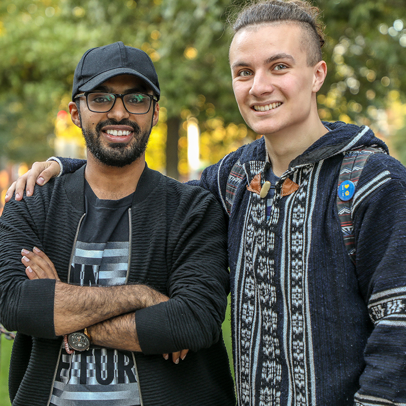A photo of an international student and American student.
