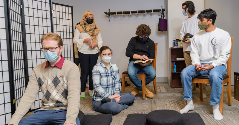 students in meditation space