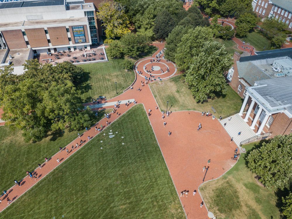 Drone aerials of a morning class change on the first day of classes for the Fall 2022 semester as seen from above the Central Green.