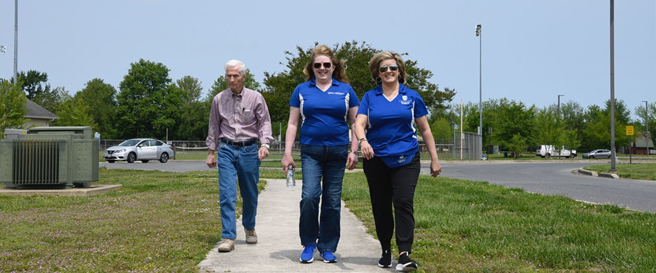 Walk and Roll Club Photo of three people walking together