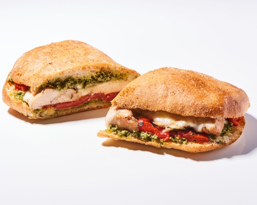 Chicken Pesto Grilled Cheese (Delaware Gold Cheese, Fireroasted Chicken Breast, Homemade Basil Pesto, Roasted Peppers)