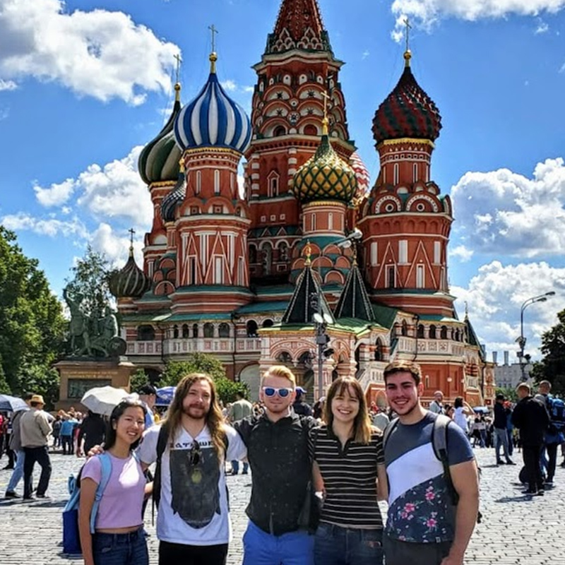 A group of students stand in front of St. Basil's in Moscow, Russia. 
