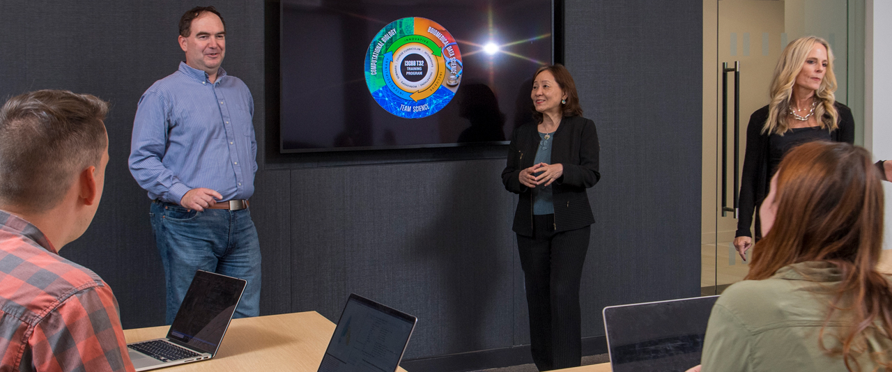Faculty Cathy Wu presenting at the during a faculty meeting of the Data Science Institute