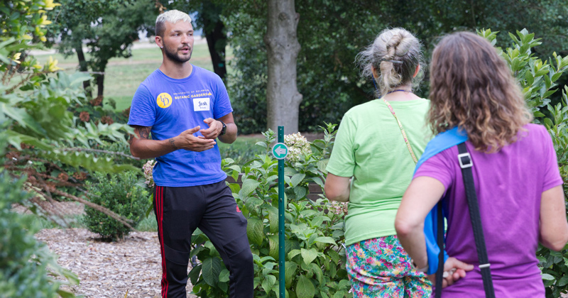 Landscape architecture major Josh McDevitt serves as a docent at a University of Delaware Botanic Gardens member and donor tour.