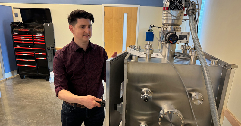 Bennett Maruca, associate professor of physics and astronomy, has a new thermal vacuum chamber in the Delaware Space Observatory Center he directs. The instrument makes it possible for University of Delaware students to develop and test CubeSat research satellites for a 2026 NASA launch.