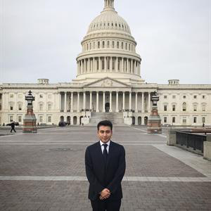 Rony Baltazar-Lopez standing in front of the Capital Building in Washington, D.C.
