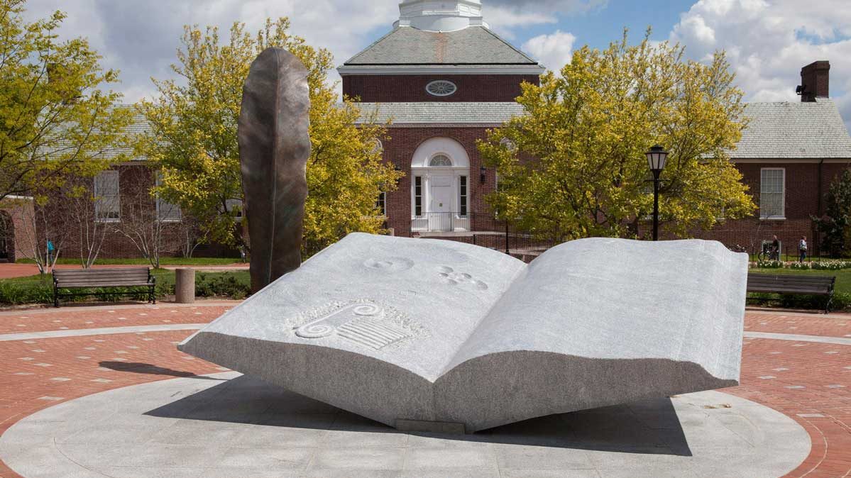 Wings of Thought book statue on the Green