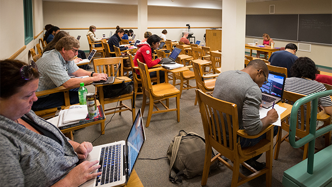 Professor Melissa Ianetta works with doctoral students on their dissertations at the Dissertation Boot camp sponsored by the Department of English.