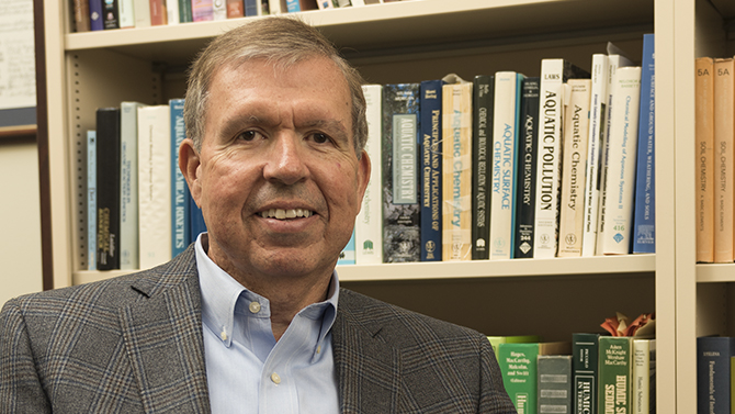 Photos of Don Sparks, the S. Hallock du Pont Chair in the Department of Plant and Soil Sciences, Francis Alison Professor, director of the Delaware Environmental Institute (DENIN) and a leader of the University’s Environmental Soil Chemistry Group, and recently named the 2015 American Chemical Society medalist; photographed in his office and with some of his graduate students in the Interdisciplinary Science and Engineering Lab for an Excellence Postcard. UNEDITED IMAGE