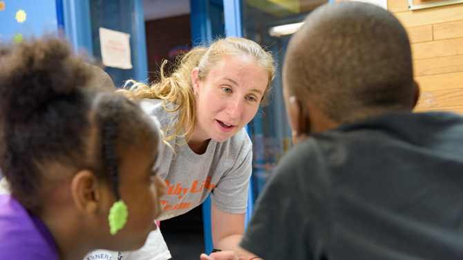 Photo Credit: Evan Krape

Photo Caption: Michelle Ernst Voegele, an Extension Nutrition Assistant, working with kids at the H. Fletcher Brown Boys and Girls Club in Wilmington.
