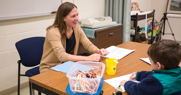 UD Assistant Professor Shannon Robson engages with a family in the Energy Balance and Nutrition Laboratory.