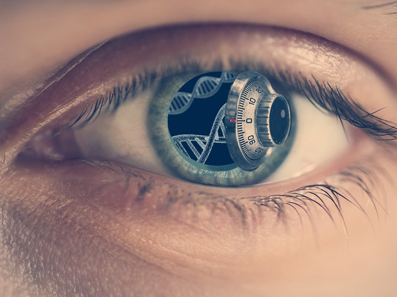 Photo illustration of human eye with lock, DNA