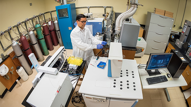 Assistant Professor of Plant and Soil Sciences Deb Jaisi working in his Townsend Hall lab. - (Evan Krape / University of Delaware)