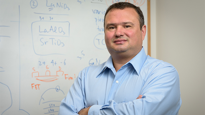 Anderson Janotti, faculty in Materials Science and Engineering, photographed in his DuPont Hall office and with his grad students Zhigang Gui and Abhishek Sharan.   - (Evan Krape / University of Delaware)