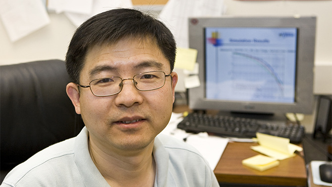Xiang-Gen Xia Xiang-Gen Xia from Electrical and Computer Engineering in his office and in his lab with students.