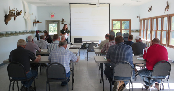 UD’s Leah Palm-Forster talks with farmers at the Paulding County Swamp Nature Center in 2013