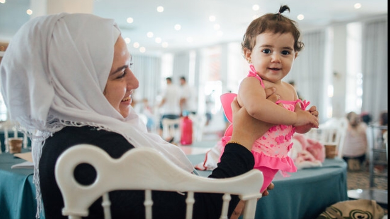 Peace Camp in Turkey showing a Syrian mother-child Mother and daughter at Peace Camp