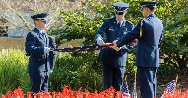 UD Army and Air Force ROTC units fold flag during the 9/11 anniversary commemoration.