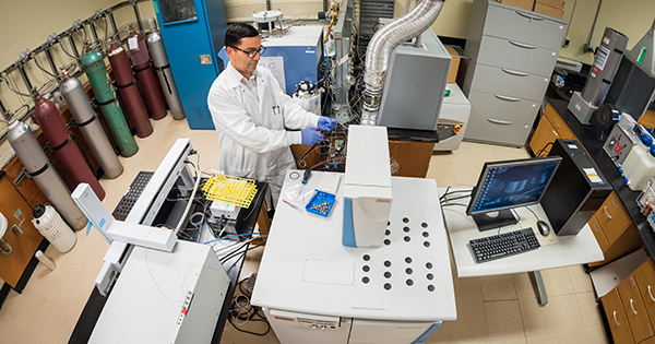 Assistant Professor of Plant and Soil Sciences Deb Jaisi working in his Townsend Hall lab. - (Evan Krape / University of Delaware)