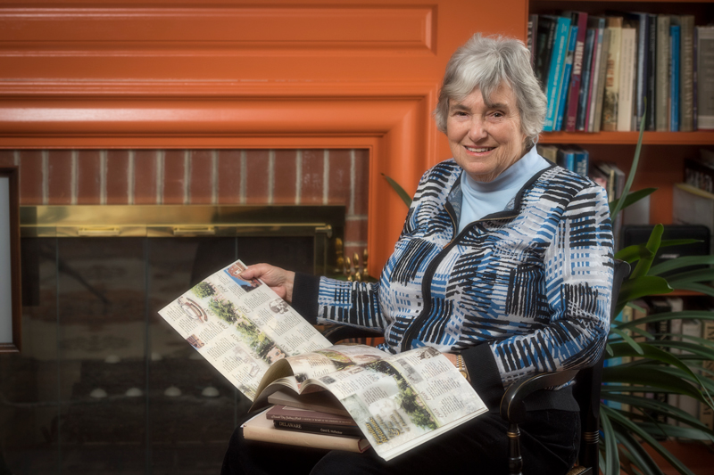 Distinguished Delaware historian Carol Hoffecker holding one of her books.