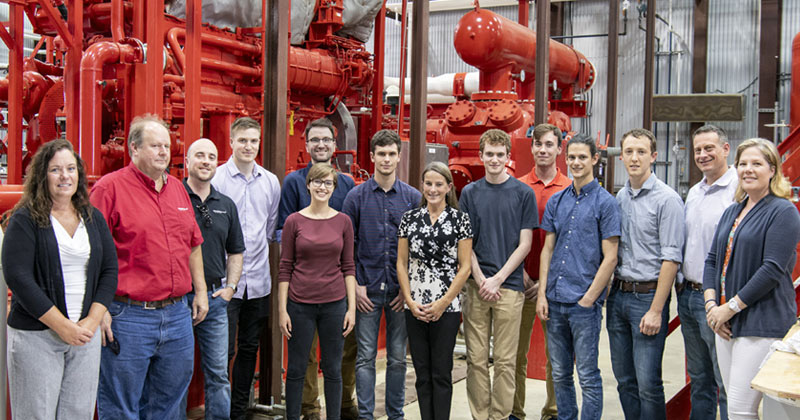 Students in the Delaware Energy Institute’s undergraduate research program gather at Eastern Shore Natural’s Gas Delaware City-based compression station, hosted by UD alumnus Al Gallo (second from right). 