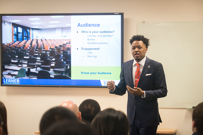 Alex Brooks, a Lerner MBA student and co-chair of the MBA Student Association Conference Committee, discusses the evolving business environment during a February meeting.
