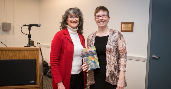 UD faculty members Laura Eisenman (left) and Stephanie Kerschbaum prepare to discuss the new book they co-edited at a lecture and book-signing on campus.