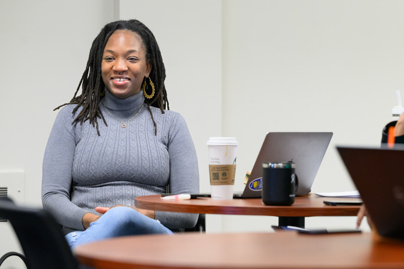 Pinkney shares her life experience with intelligence and humor, helping fellow students make connections between academic theories and the community.