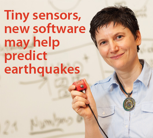 Michela Taufer holds an earthquake sensor
