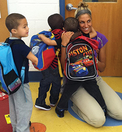Elena Delle Donne with young school children