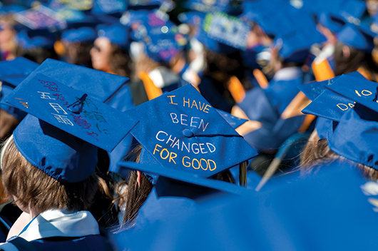 Student in graduation caps at spring commencement