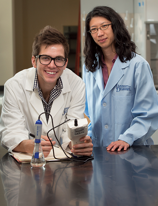 Joshua Barnett and Clara Chan in lab
