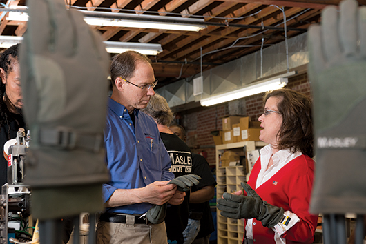 Frank and Donna Masley discuss business at their production site.
