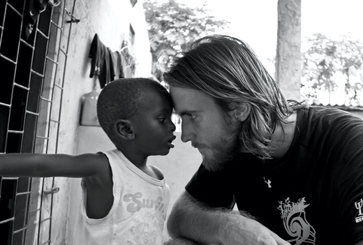 Stephen Pope with boy from Mozambique