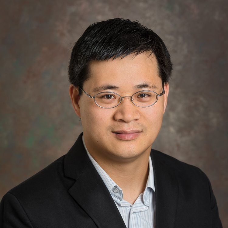 Publicity photo of Guoquan Huang, assistant professor of mechanical engineering.