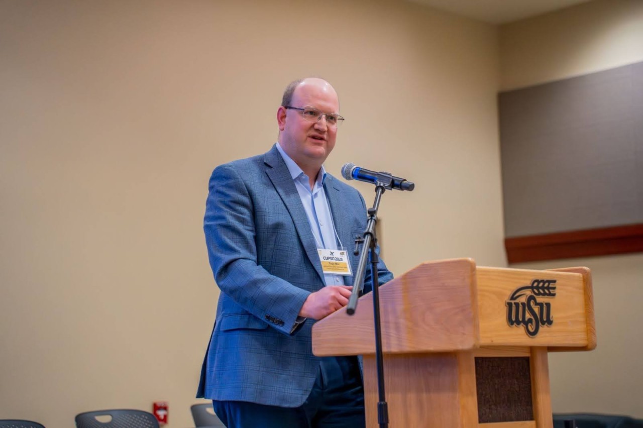 Troy Mix Troy Mix speaking at podium during the CUPSO 2025 Conference