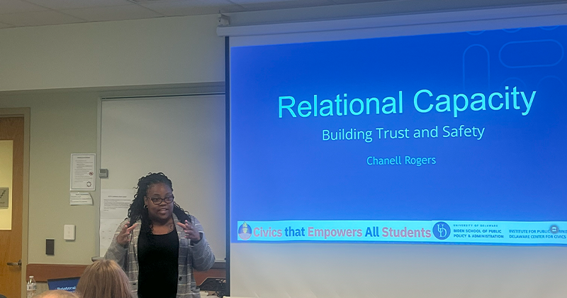 Photo featuring education mentor Chanell Rogers leads a session on relational capacity with a focus on building trust and safety. 