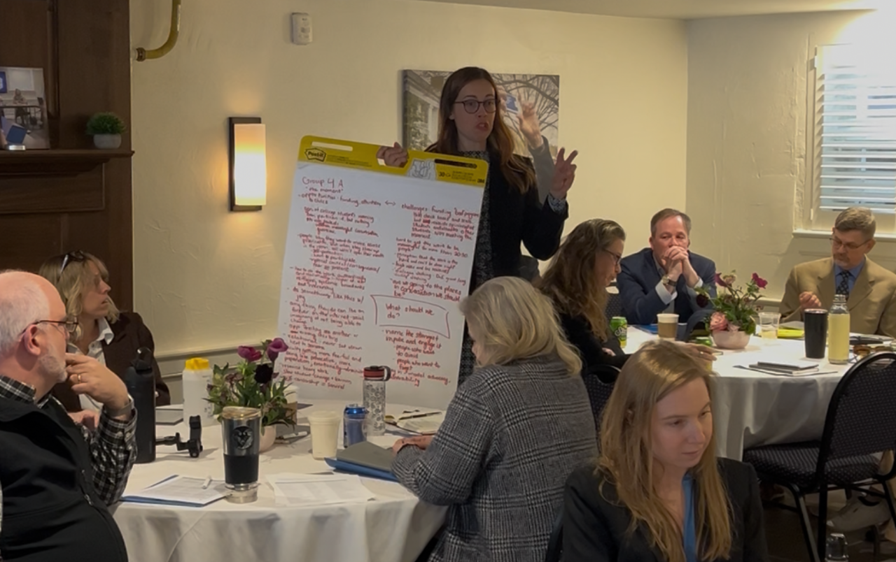 Image of a participant sharing ideas with the group at the national leadership summit