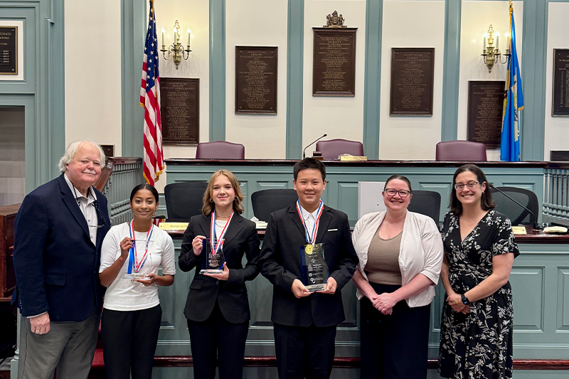 Participants and judges of the 2026 Delaware National Civics Bee pose for a photo