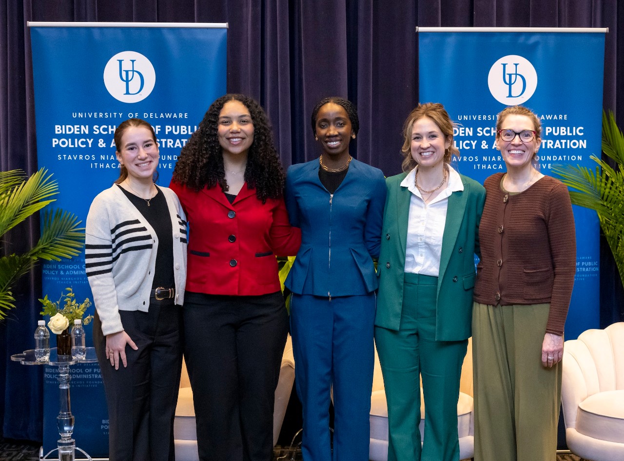 SNF Ithaca Student Leaders Danielle Blachar and Sophie Douglas posing with SNF Ithaca Visiting Fellow Dr. Sally Nuamah and SNF Ithaca Professors Dr. Kristie LeBeau and Dr. Jane Case.