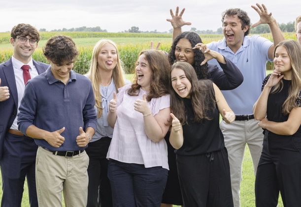 SNF Ithaca Student Leader, Charlotte McQuillan posing with her fellow student leaders