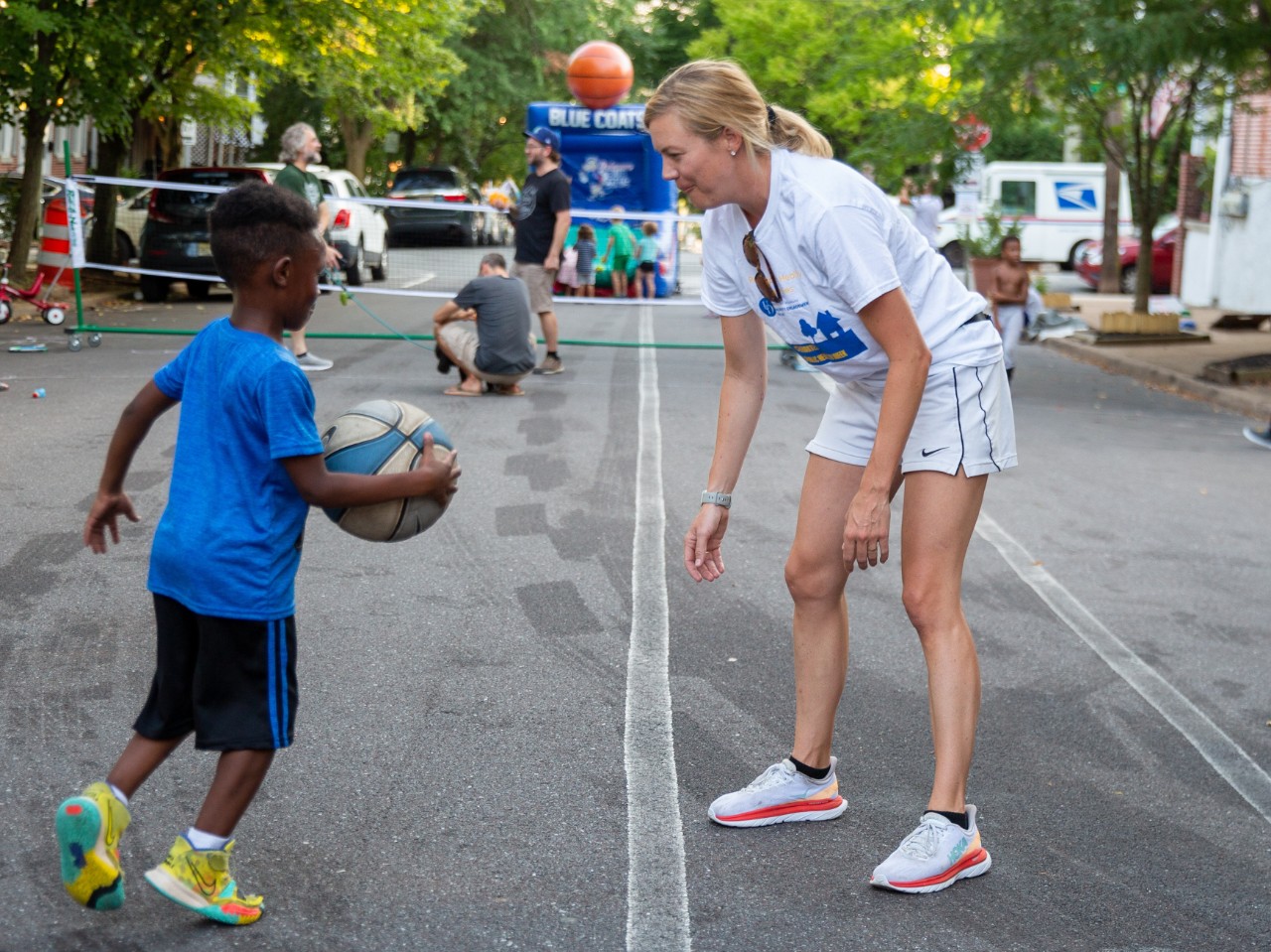 MPH student plays with child during Wilmington Play Streets