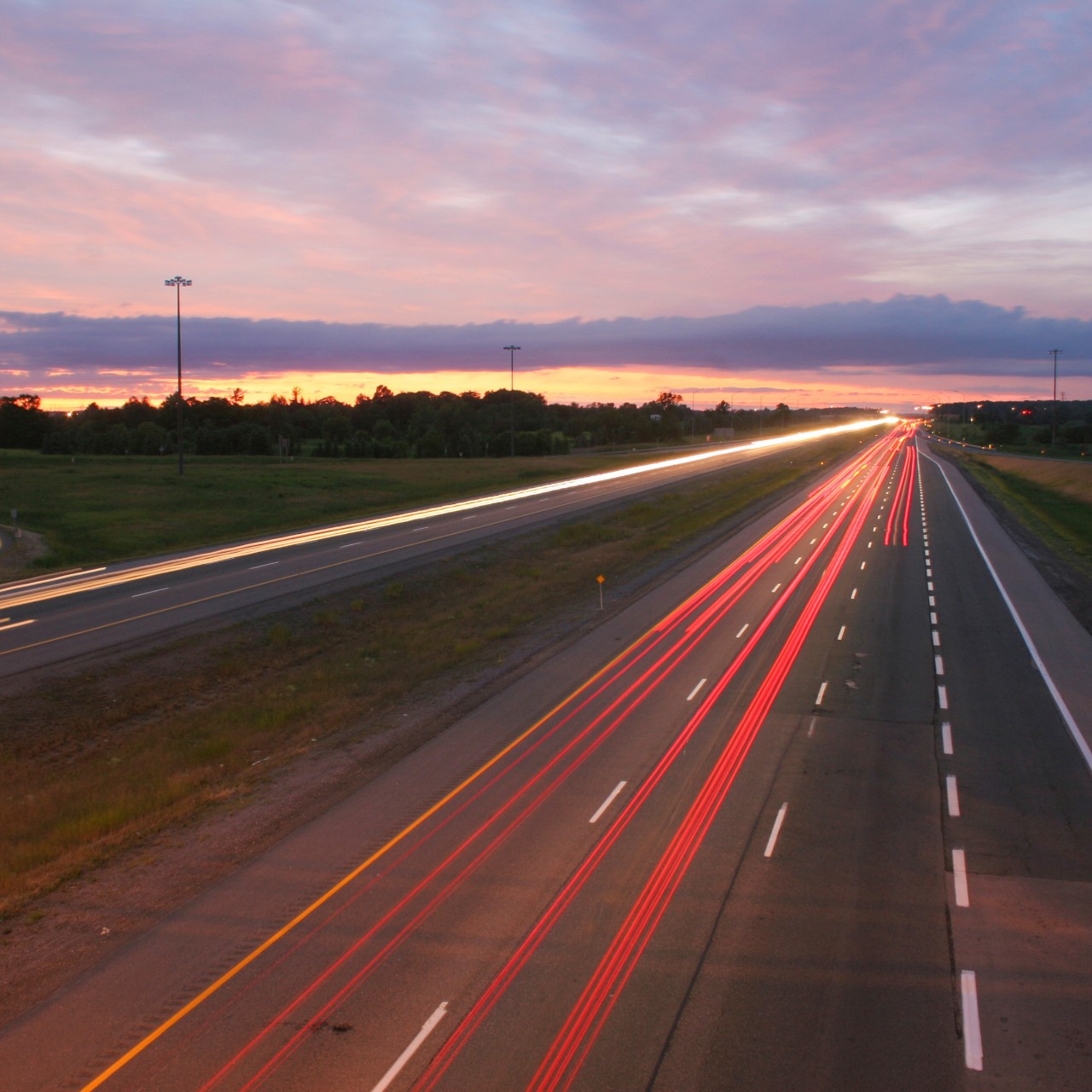 Aerial photo of a busy highway during sunset
