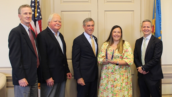 (From left to right) Fran O'Malley, Ed Freel, Delaware Governor John Carney, Christina Horstmann and Scott Abbott pose for photo at the first Governor’s Award for Excellence in Civics Education ceremony