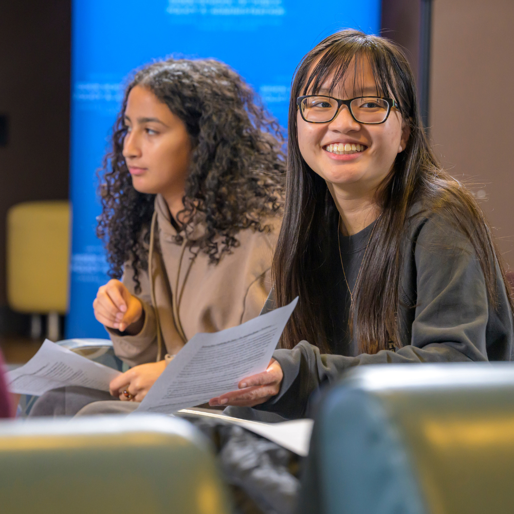 Photo of three past SNF Ithaca Student Leaders at a welcome reception event