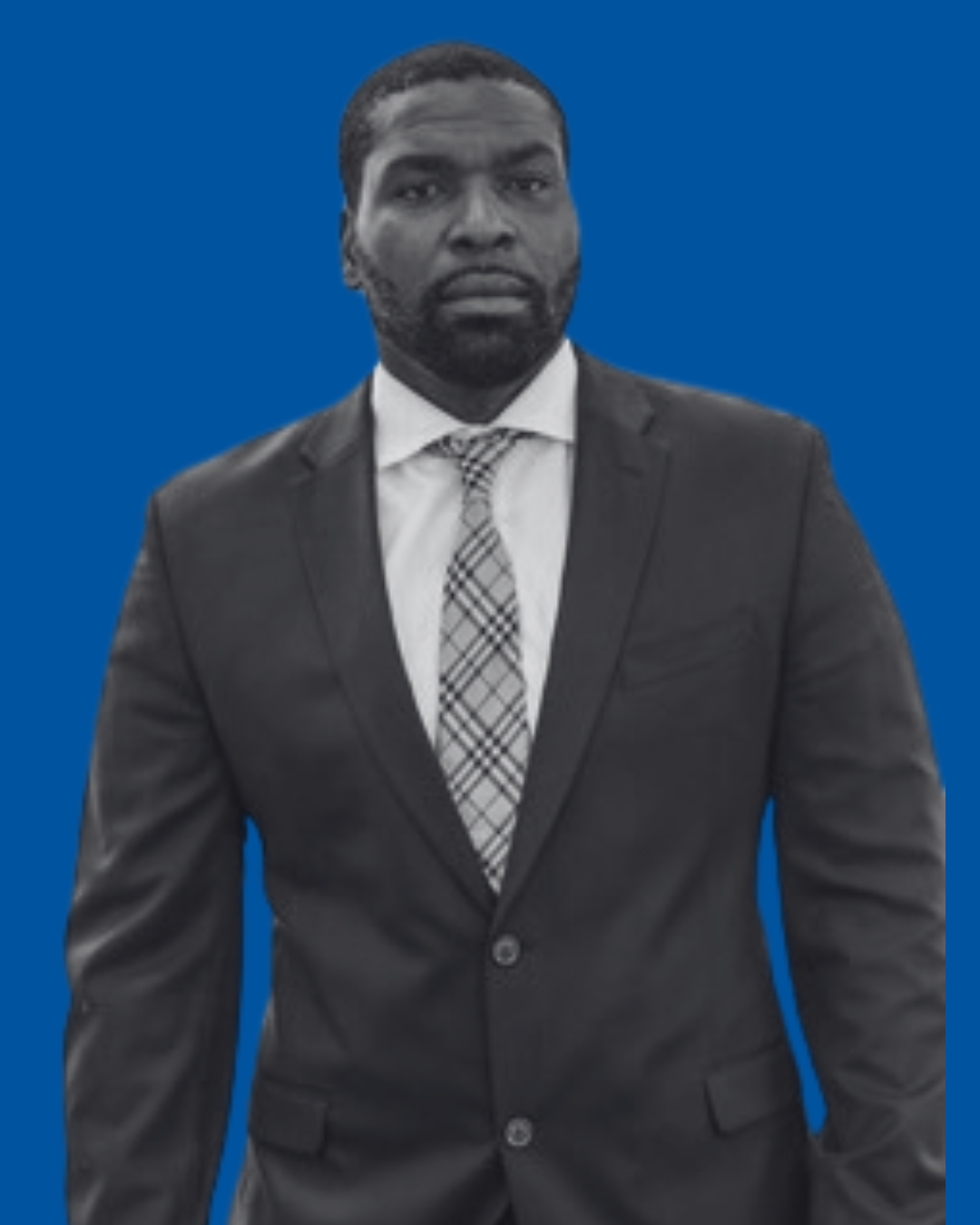 A black-and-white portrait of a person against a solid blue background